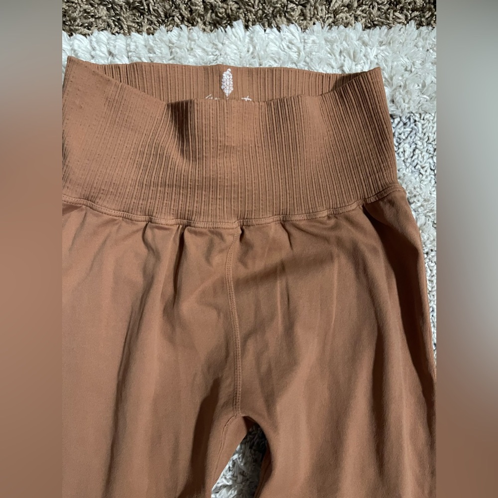 Free People Movement Good Karma Flare Leggings color-dark tan - Picture 3 of 7